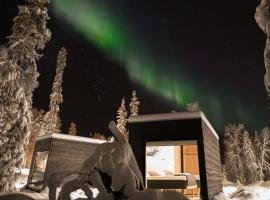 Kalnu kotedža Vaattunki Wilderness Resort pilsētā Rovaniemi