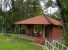 Nature Spot Cottages Coorg, familjehotell i Kurchi