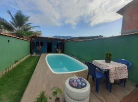 Casa com piscina na divisa โรงแรมในคารากัวตาตูบา