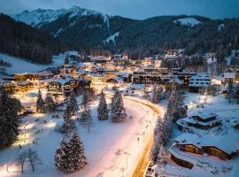 Dolomiti - Trilocale tipico a 5 minuti dalle piste，馬東納迪坎皮利奧的飯店