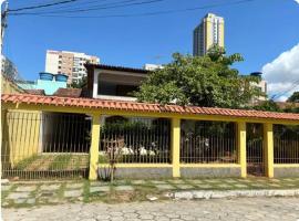 Quartos individuais e coletivos - Praia de itaparica, hotell i Vila Velha