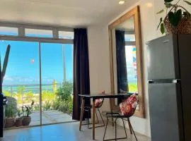 Beachfront Apartment with Kitchen and Outdoor Seating Area