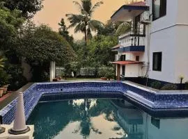 Goaround Suites at Vagator - 1BHK Home with Kitchen & Swimming Pool