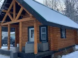 Lofted log cabin with fire table