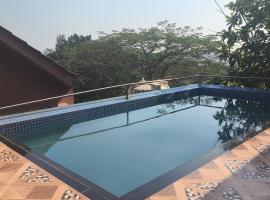 WoodStock Villa, hotell Mumbais