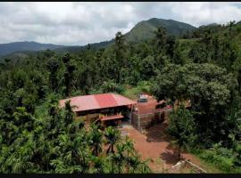 Meruthi Gudda Homestay, hotel Kalasa városában 