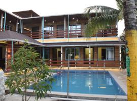 Sailee Farm & Resort With Pool, hotel di Nagaon