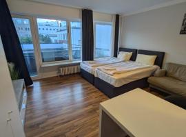 1,5-Zimmer Apartment mit Balkon am Hauptbahnhof, hotel di Neumunster