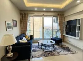 Modern 1-Bedroom on Top Floor with Scenic Views at Elysium