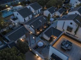 Tan Alley Wuzhen Eco and Cultural Community, хотел в Tongxiang