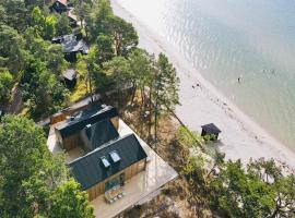 Villa with beach plot and sea view - Åhus, Äspet، فندق في وارسو