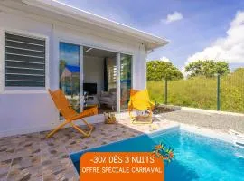 Domaine "Alizé Sainte-Marthe" - 3 Bungalows avec Piscine Privée - Idéal Couple & Famille - Clim - Mini Green de Golf - Wifi - Calme - 5min St-François Centre