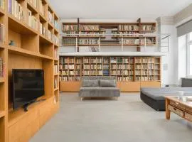 Unique and Bright Library Apartment Near Old Town in Wrocław by Noclegi Renters