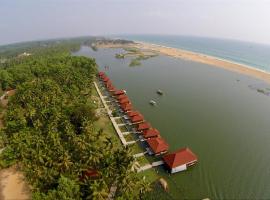 Poovar Island Resort, viešbutis mieste Pūvār