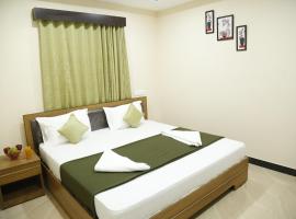 Hotel New Amirtham inn, hotell i Palni