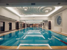 Stella Residence Club, hotel amb jacuzzi a Odessa