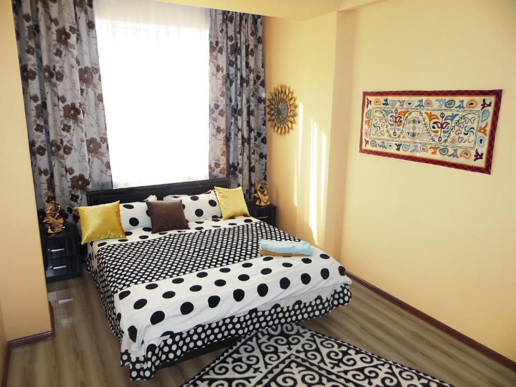 Krevet ili kreveti u jedinici u objektu Bishkek Maximus Apartament 2