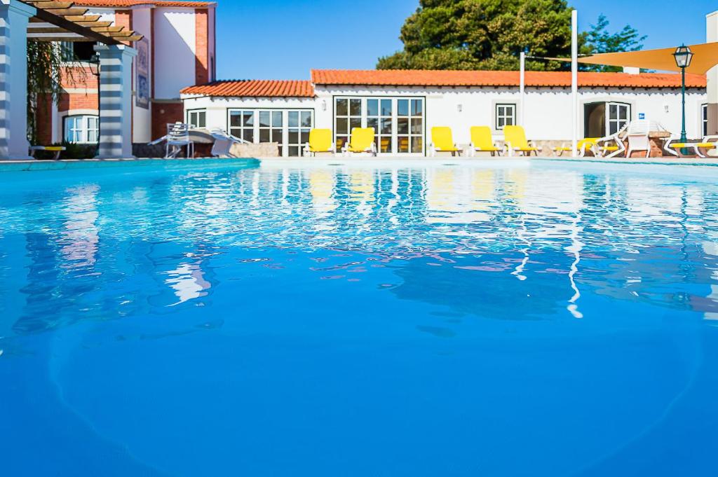 The swimming pool at or close to Casa Da Padeira - Turismo Rural