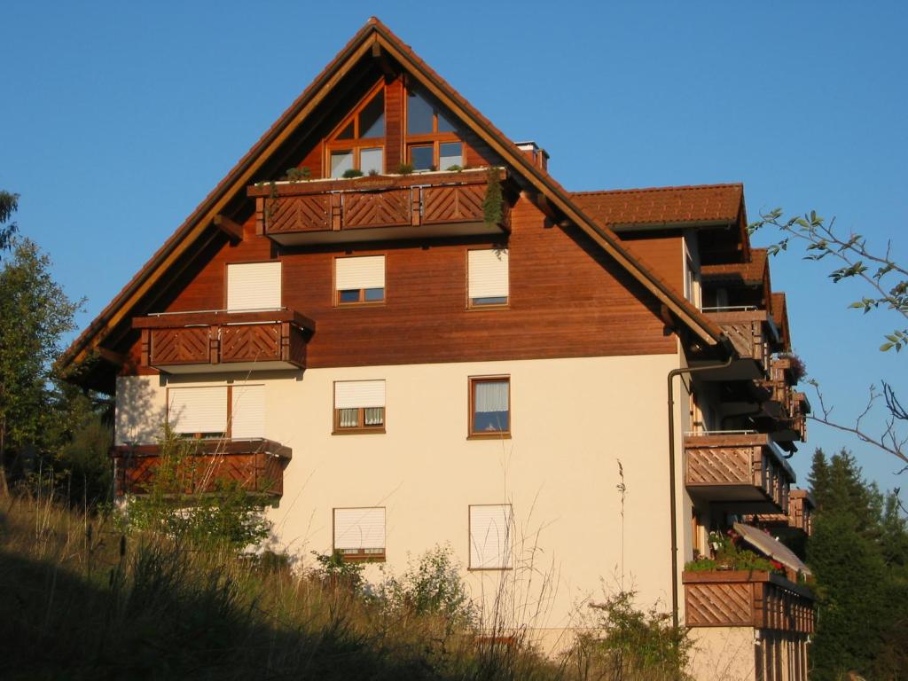 a house with balconies on the side of it at Urseetalblick in Lenzkirch