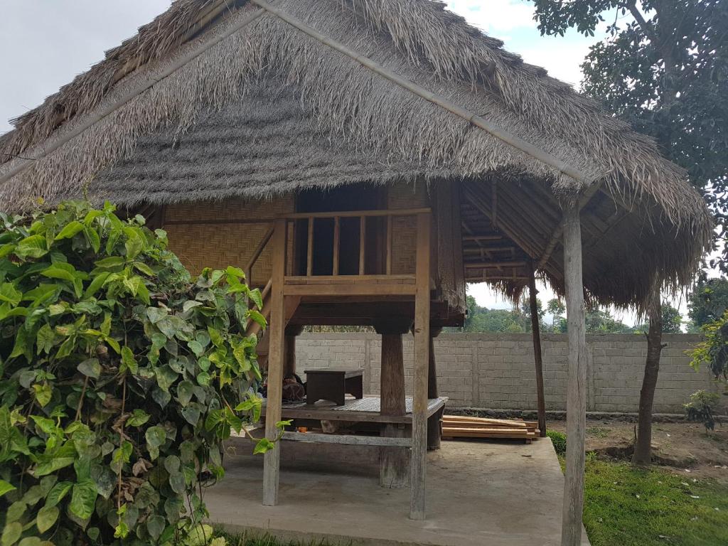 Um jardim em Rinjani Family Homestay