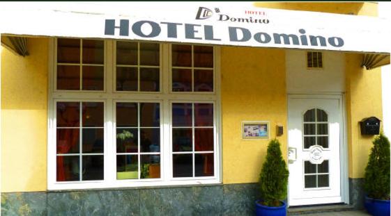 Сертификат, награда, вывеска или другой документ, выставленный в Hotel Domino