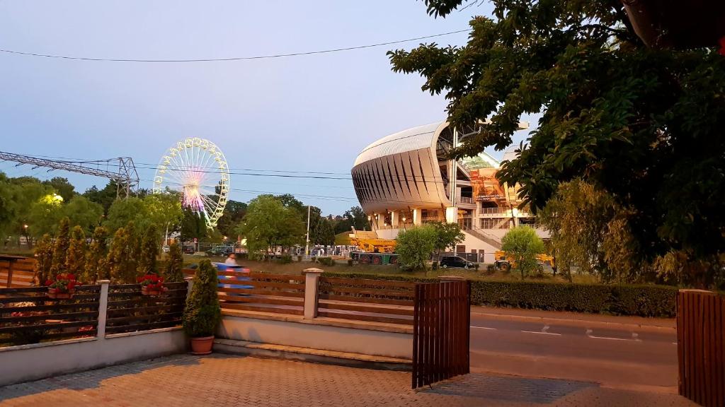 a view of a amusement park with a ferris wheel at Villa Parc in Cluj-Napoca