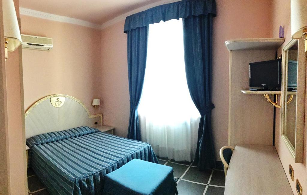 Postel nebo postele na pokoji v ubytování B&B Villa Primavera