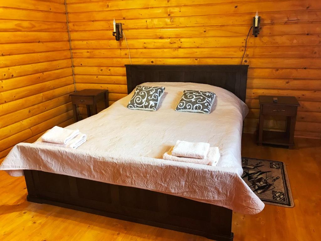 Кровать или кровати в номере Guest House U Stasuka