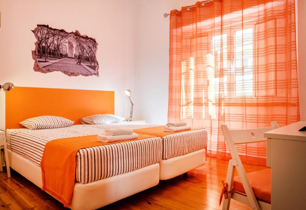 Postel nebo postele na pokoji v ubytování Loulé Coreto Hostel