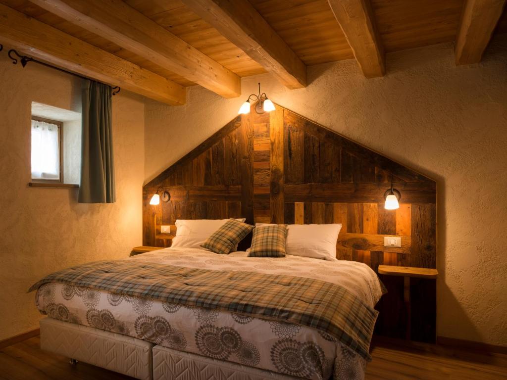 Cama ou camas em um quarto em Chambres d'hôtes La Moraine Enchantée