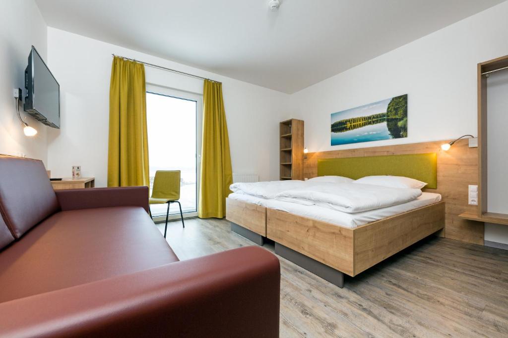 Postel nebo postele na pokoji v ubytování Cleverhotel