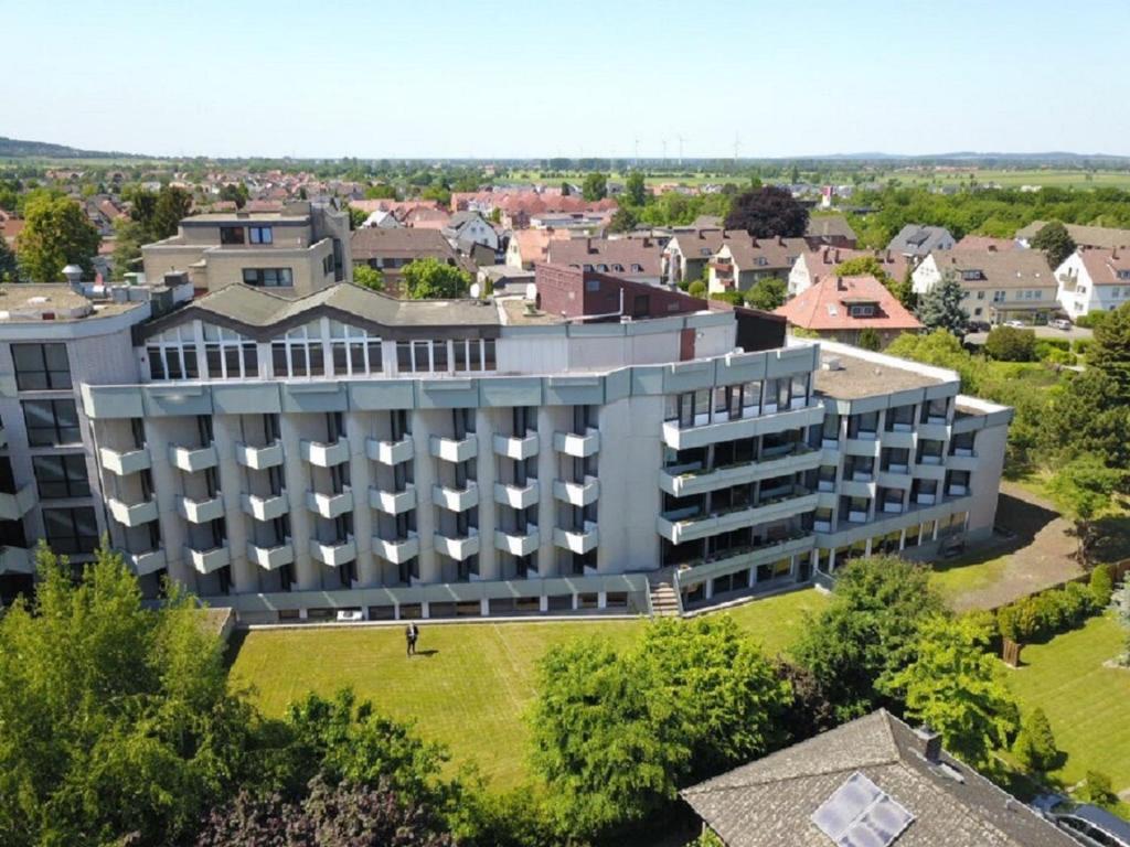 an aerial view of a building in a city at Karaman Group Hotel in Bad Nenndorf