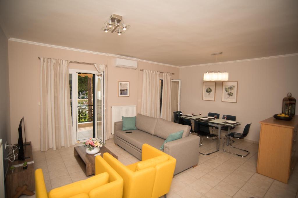 a living room with a couch and a table at Mary's House in Lefkada Town