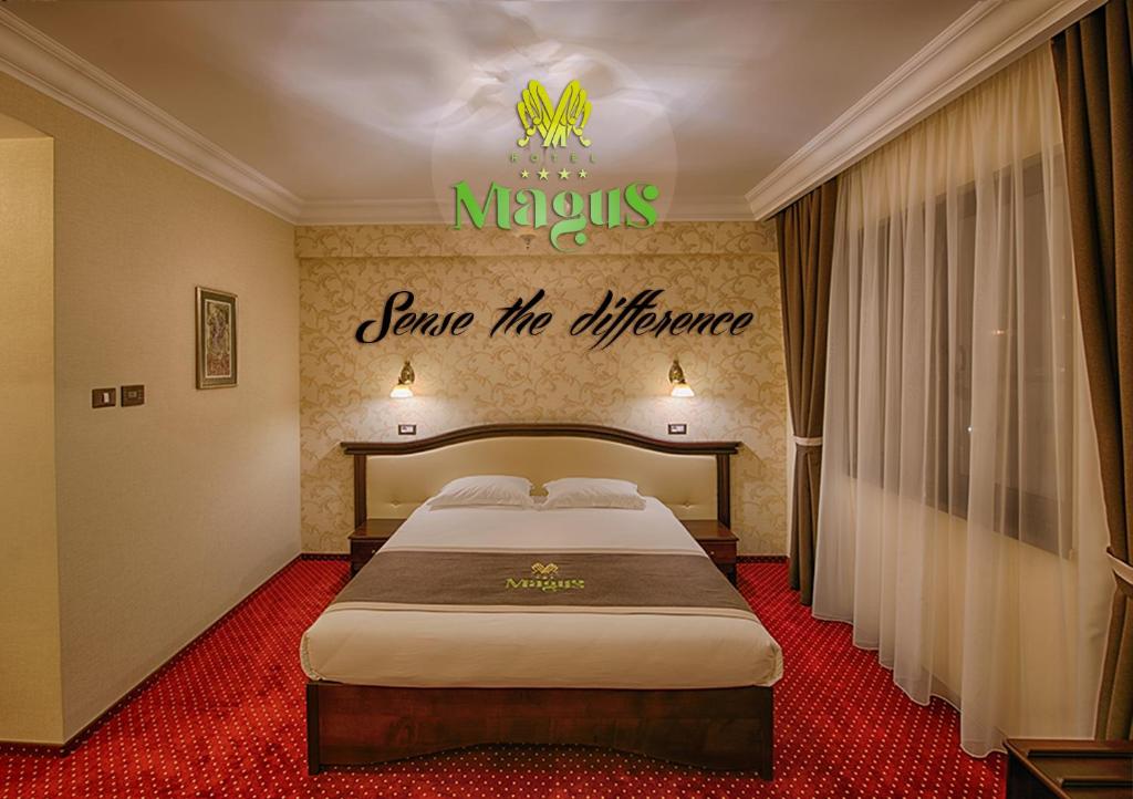 Voodi või voodid majutusasutuse Magus Hotel toas