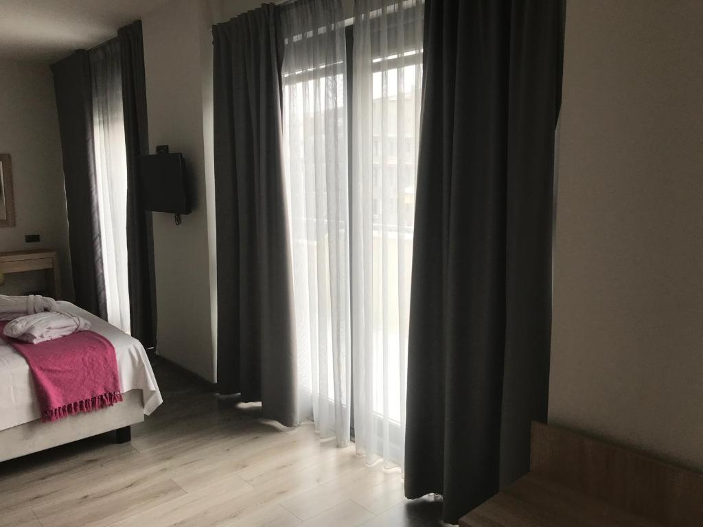 Krevet ili kreveti u jedinici u okviru objekta Superior One Boutique Hotel