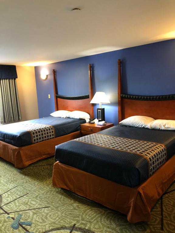 Кровать или кровати в номере Budget Inn Williamsport