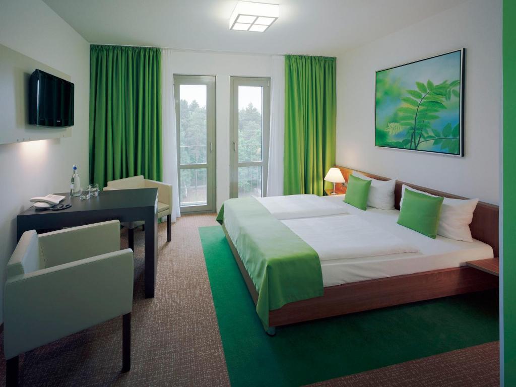 Cama ou camas em um quarto em Akademiehotel Dresden