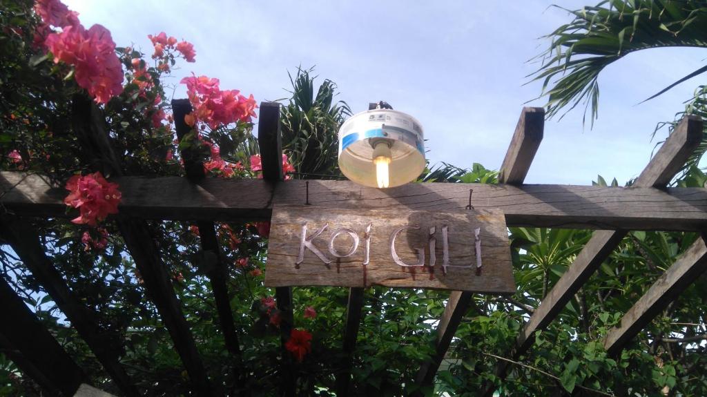 Vrt pred nastanitvijo Koi Gili Guest House