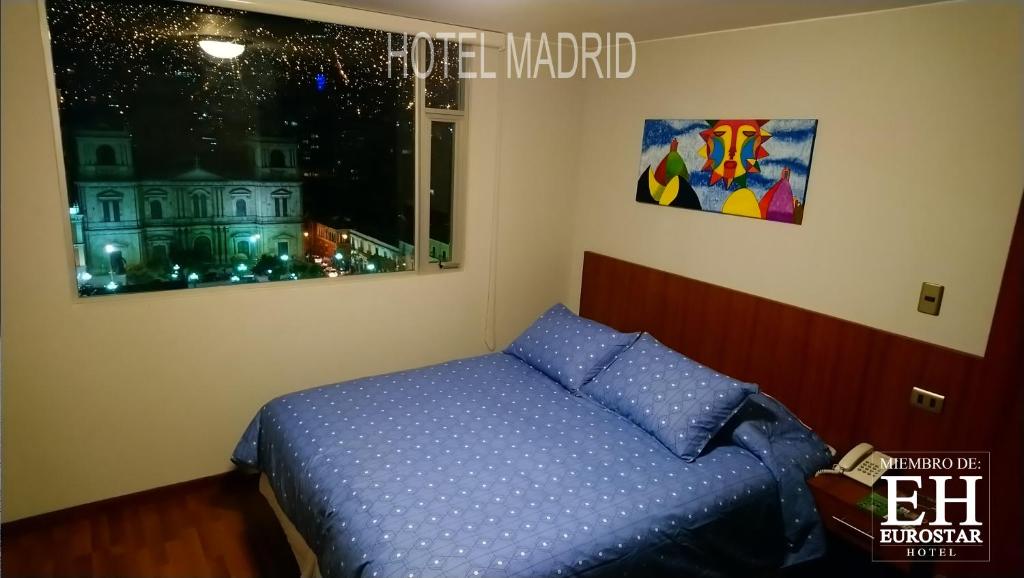 Krevet ili kreveti u jedinici u okviru objekta Hotel Madrid