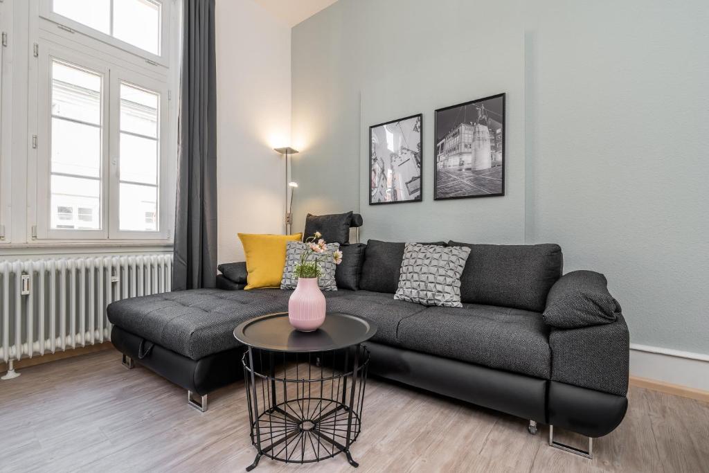 Зона вітальні в Freiburg Appartements am Augustinerplatz