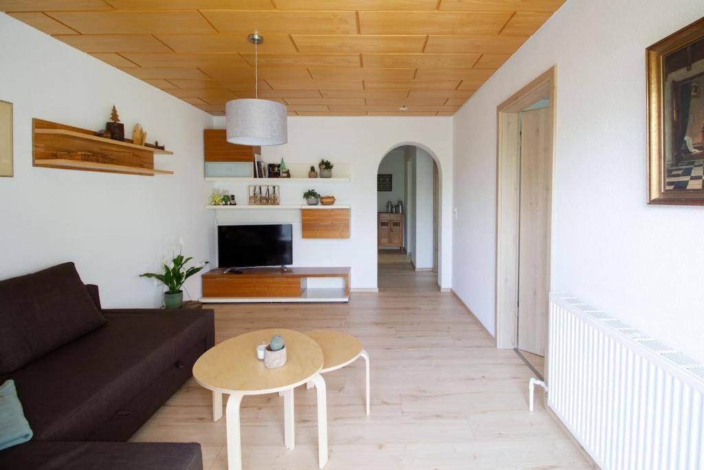 Area tempat duduk di Schöne und helle Ferienwohnung in Pfaffenweiler