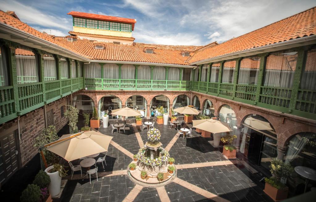 Reštaurácia alebo iné gastronomické zariadenie v ubytovaní Aranwa Cusco Boutique Hotel