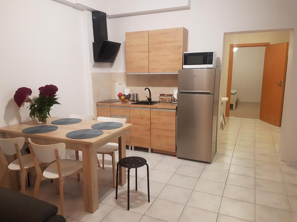 Кухня или мини-кухня в Apartamenty i pokoje Pluszak
