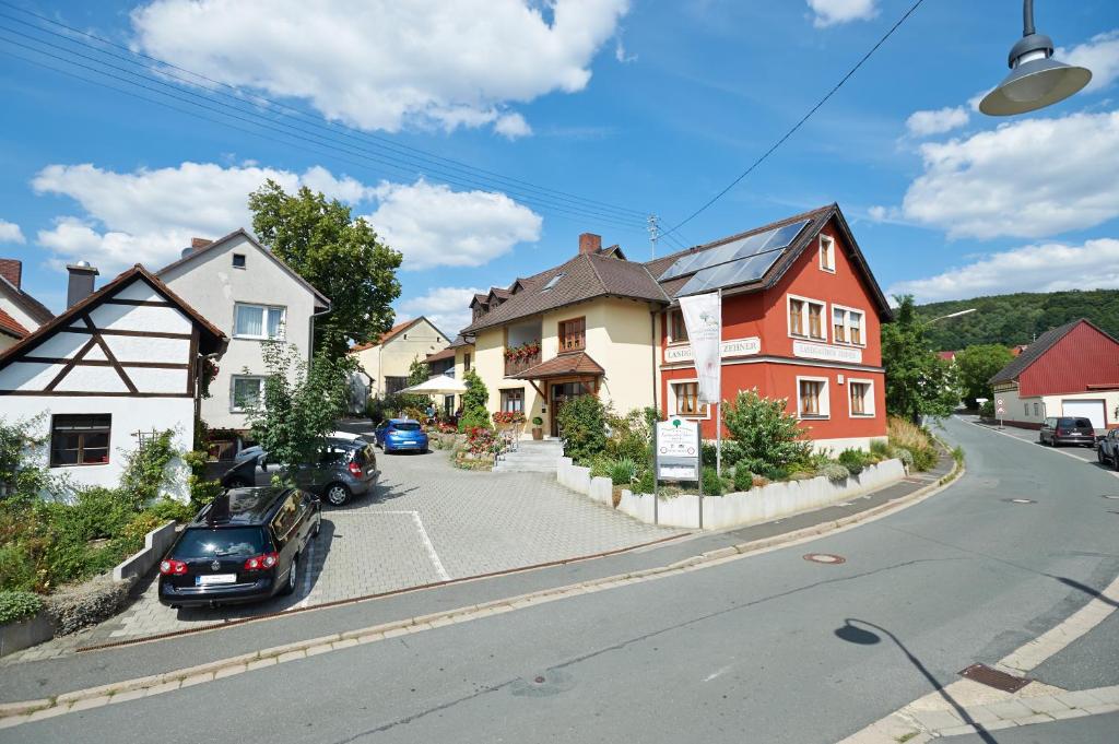 a model of a street with houses and a car at Landgasthof Zehner in Drosendorf