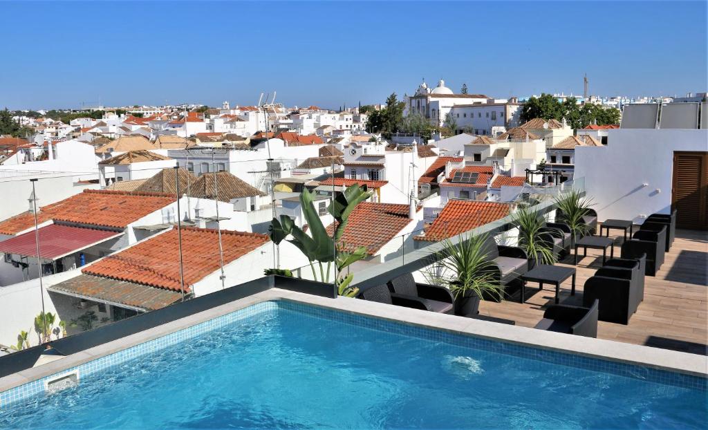 Piscina a Authentic Tavira Hotel o a prop