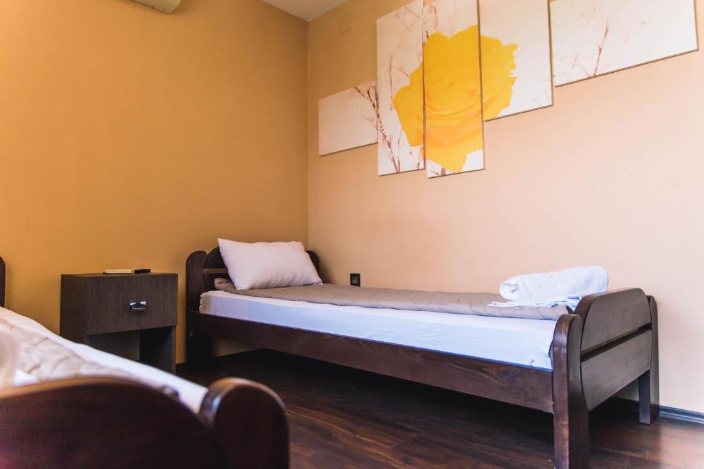 Cama ou camas em um quarto em Guest House Vila Salute