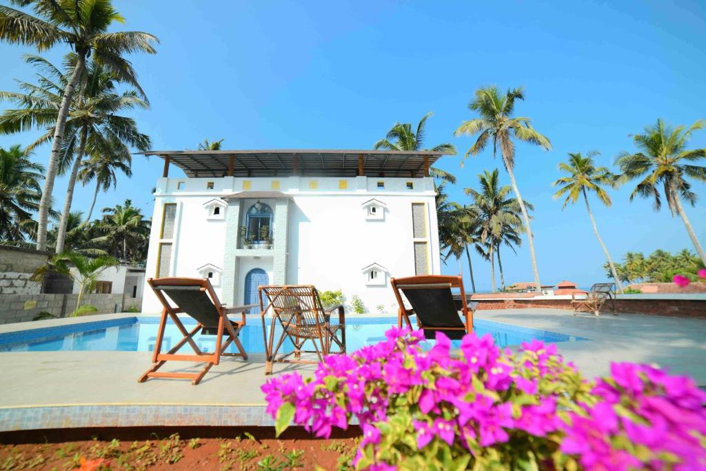 Сад в Magnolia Guesthouse Varkala