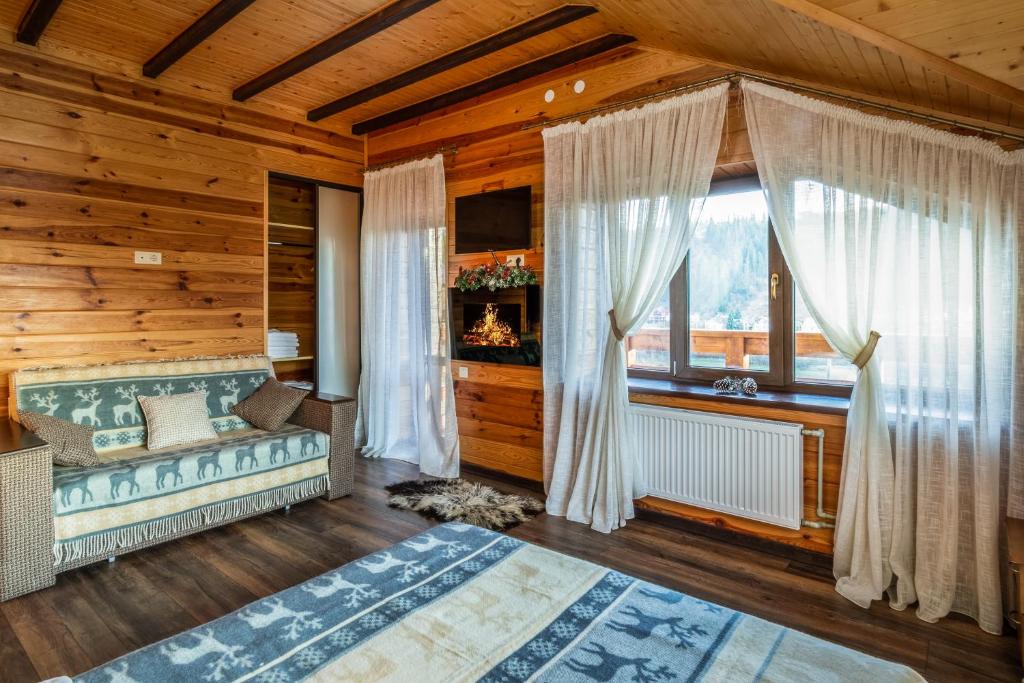 Cama ou camas em um quarto em Cottage Chalet-Tiara