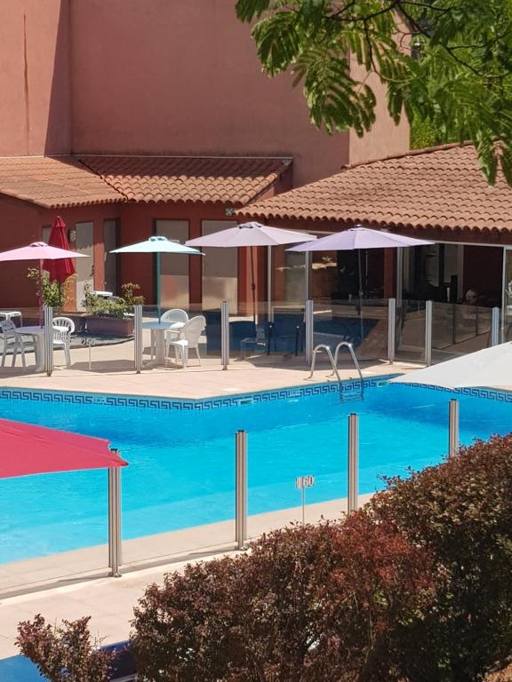 Bazen v nastanitvi oz. blizu nastanitve Albatros Appart 40 m2, 2 pièces près côte d'azur, piscine, parking, proche du Golf St Donat