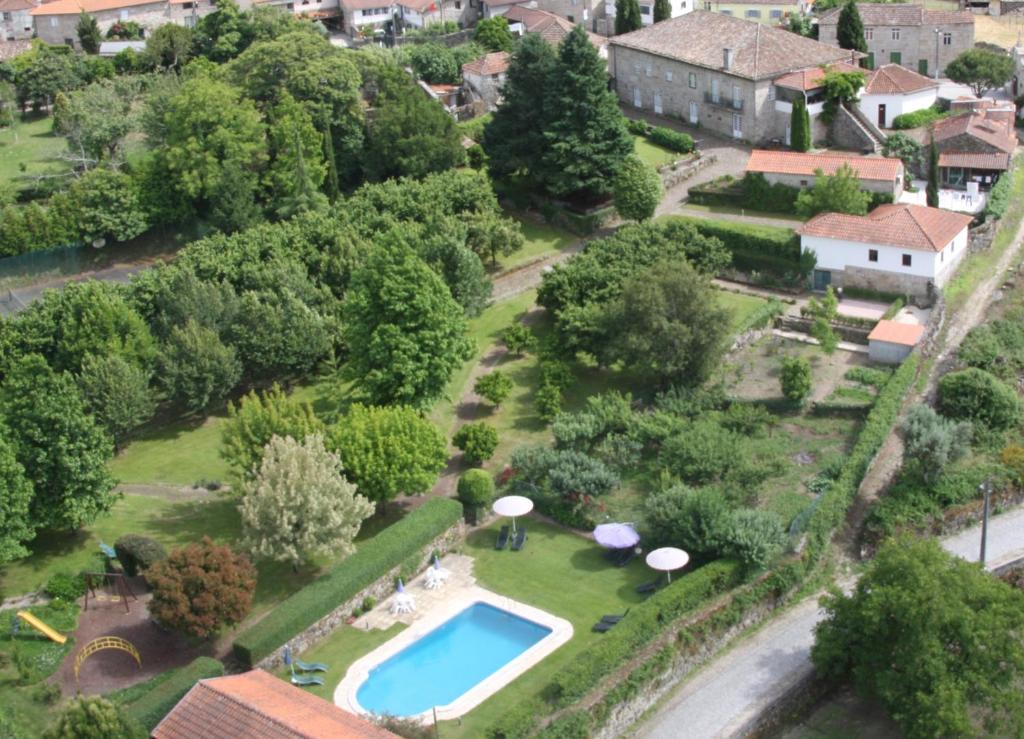 an aerial view of a estate with a swimming pool at Casa De Fatauncos in Vouzela